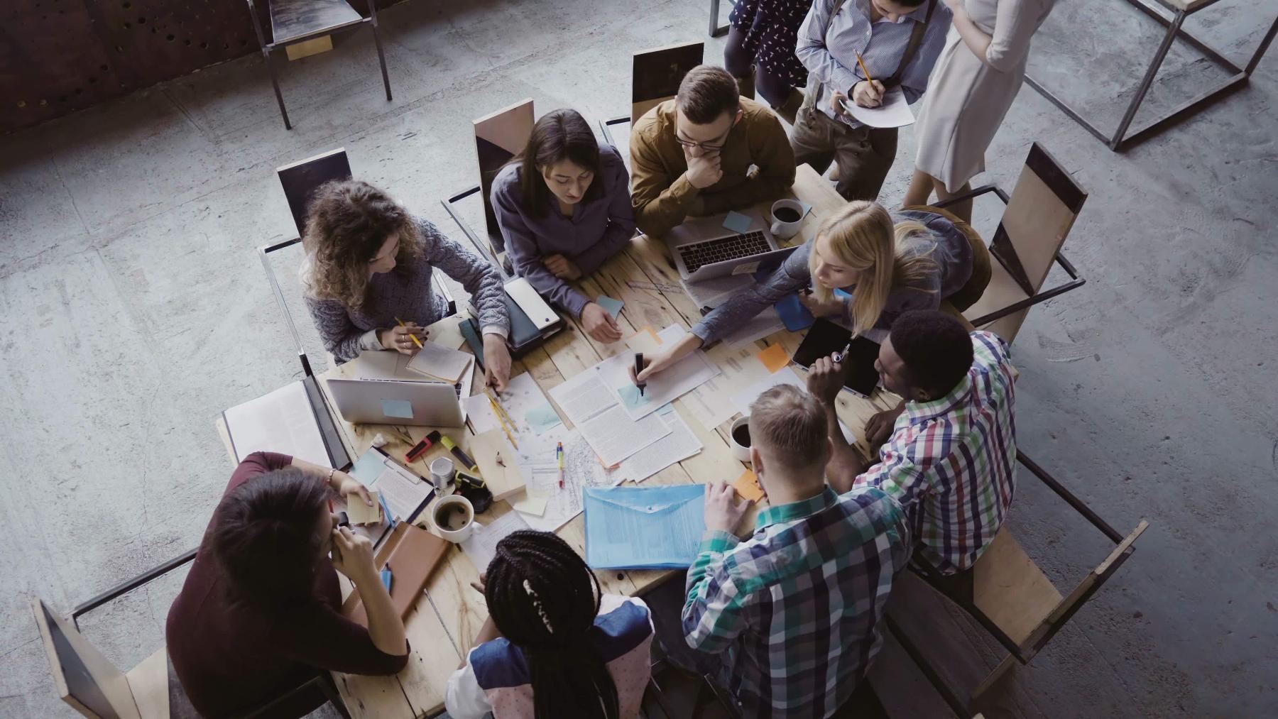 people working around a table
